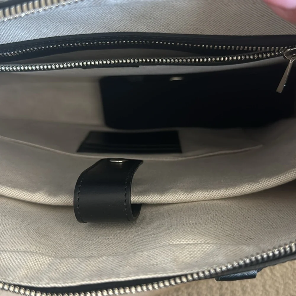 New-Gucci leather bag. Can be used for work or travel. fit laptop & work files.